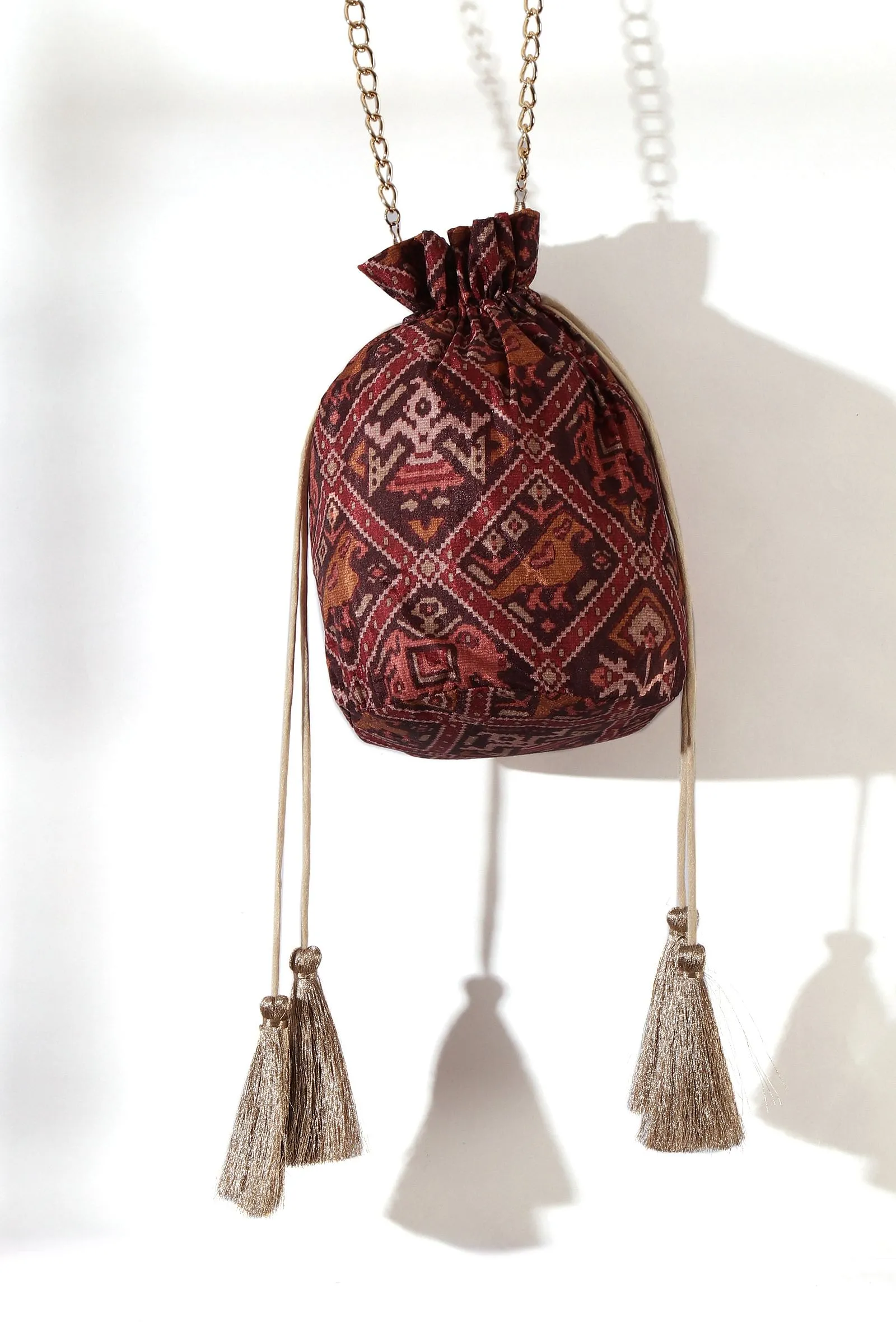 Geetika Maroon & Multi Silk Patola Print Potli With Tassels