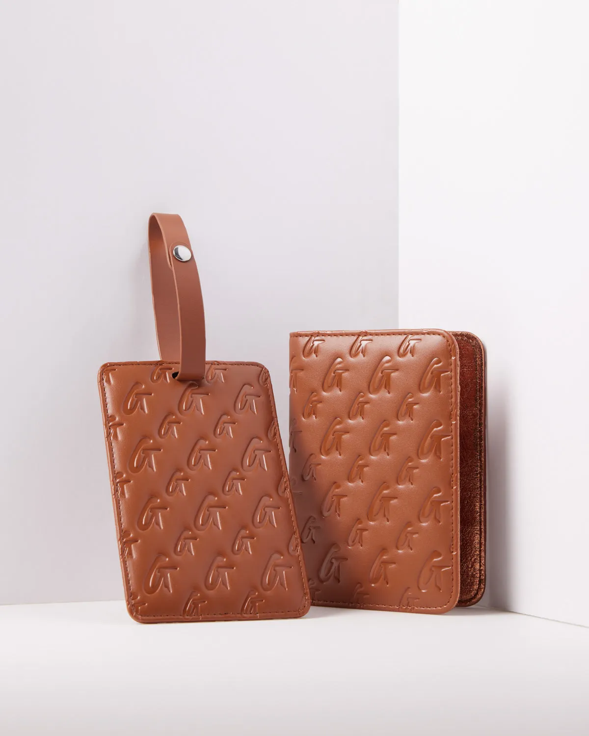 MONOGRAM PASSPORT HOLDER - BROWN