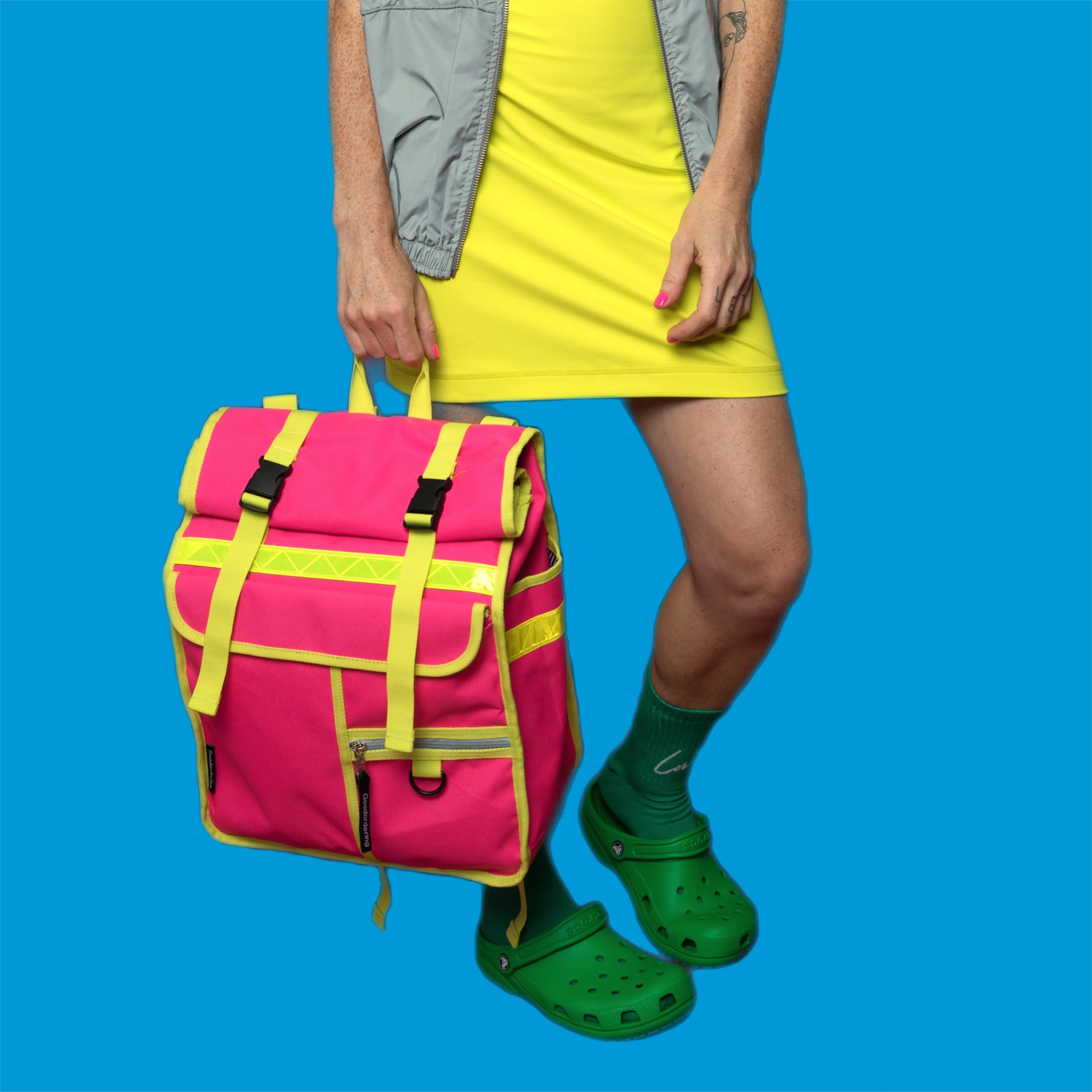 Neon pink rolltop backpack pannier bike bag