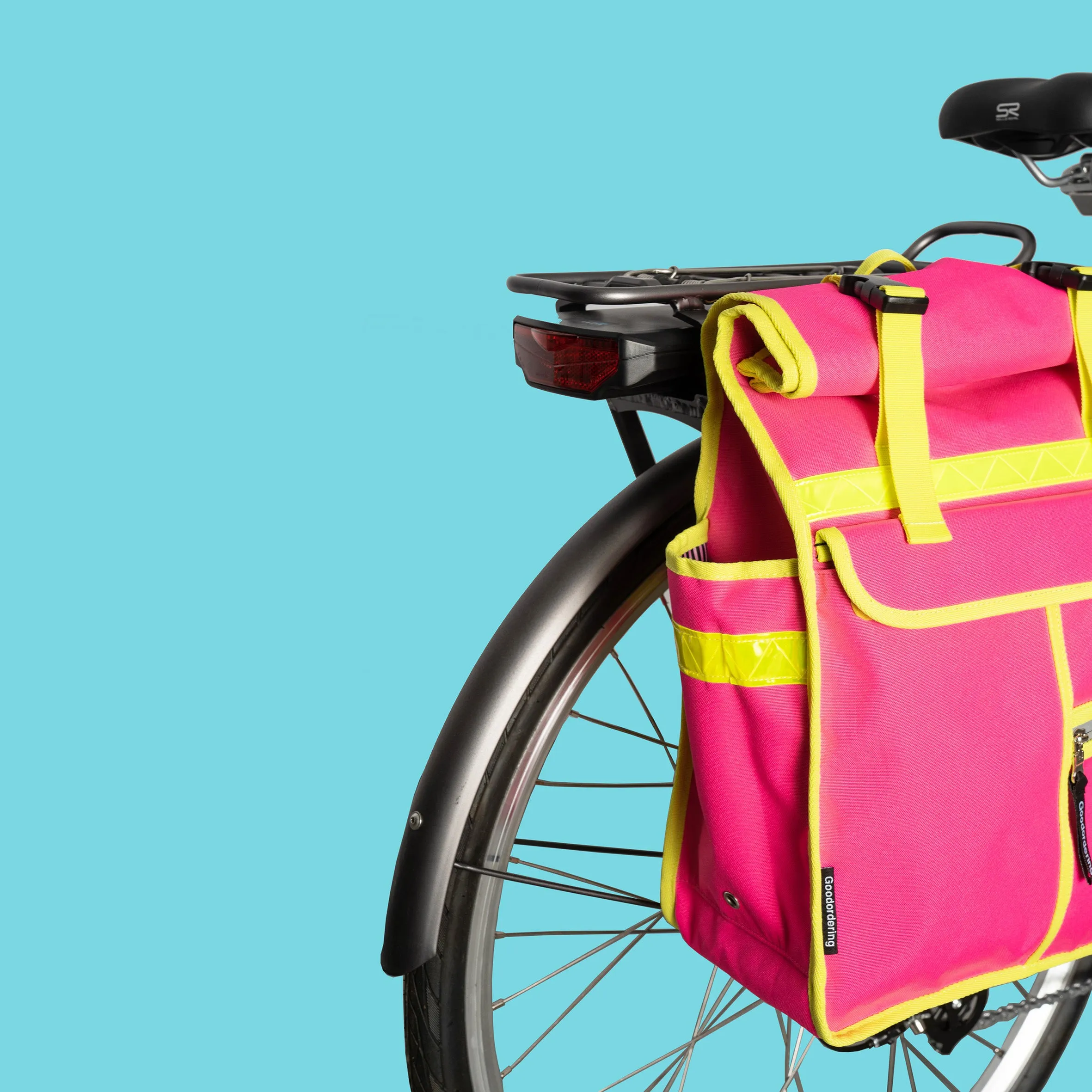 Neon pink rolltop backpack pannier bike bag