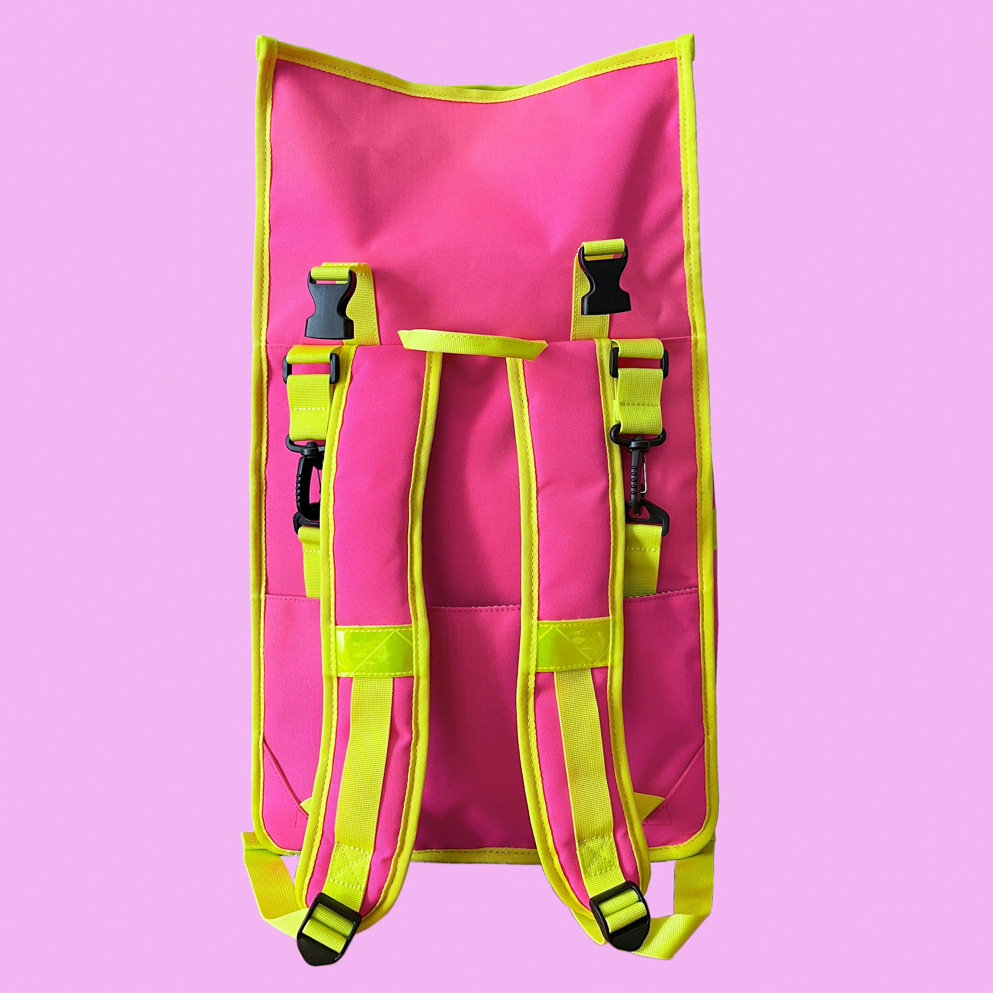 Neon pink rolltop backpack pannier bike bag