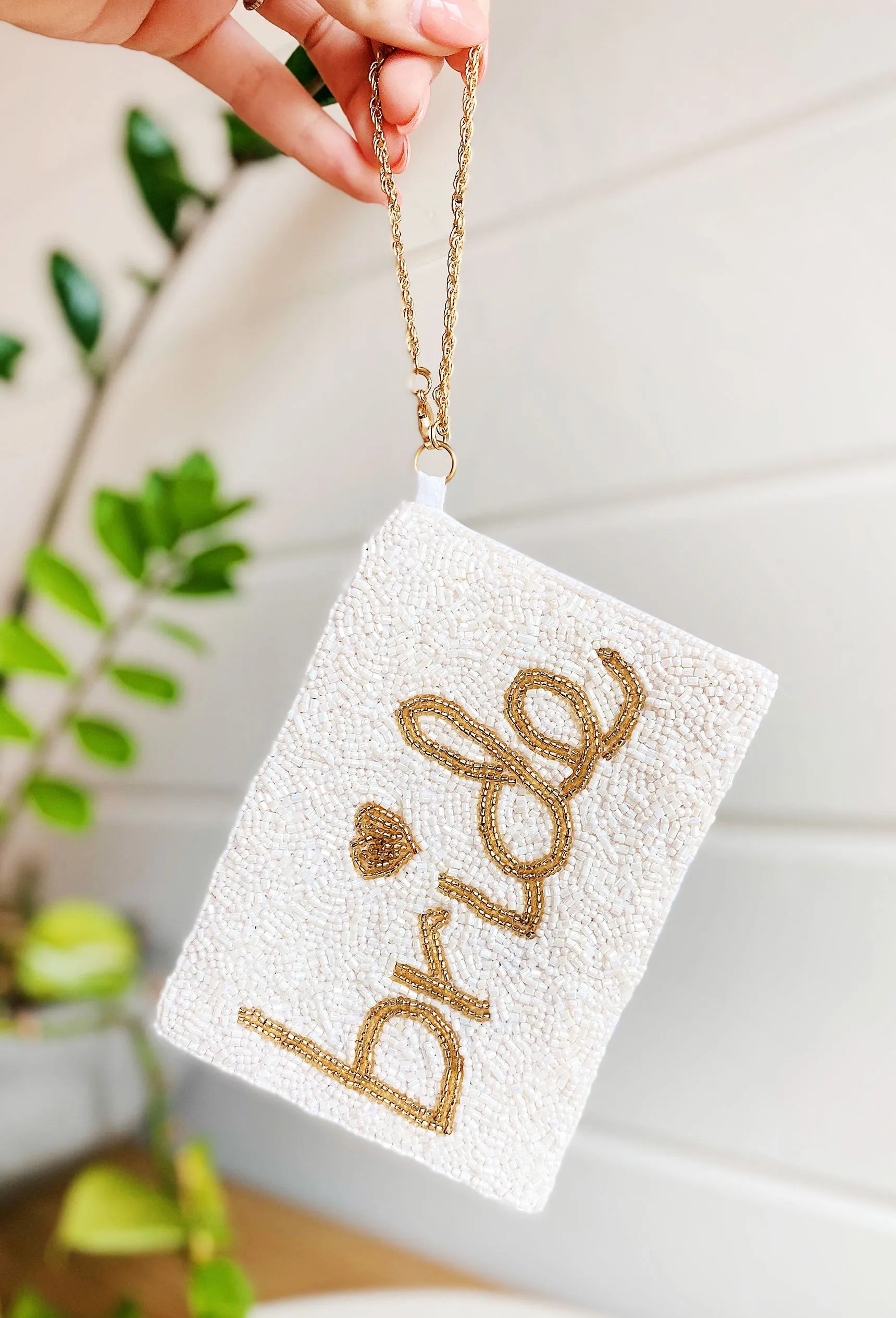 white beaded bride pouch